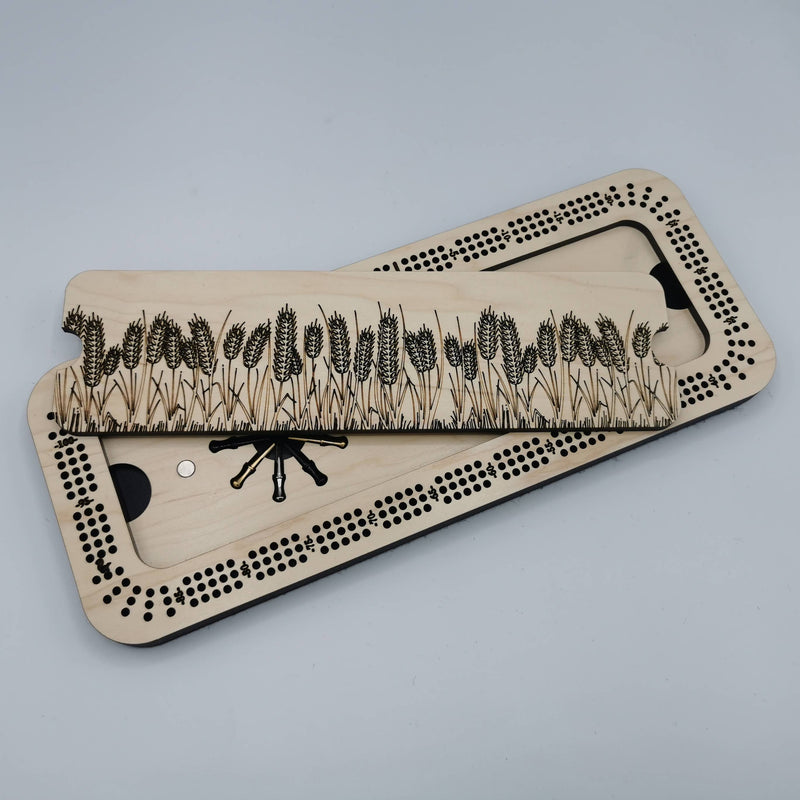 Wheat design engraved on a three-track cribbage board