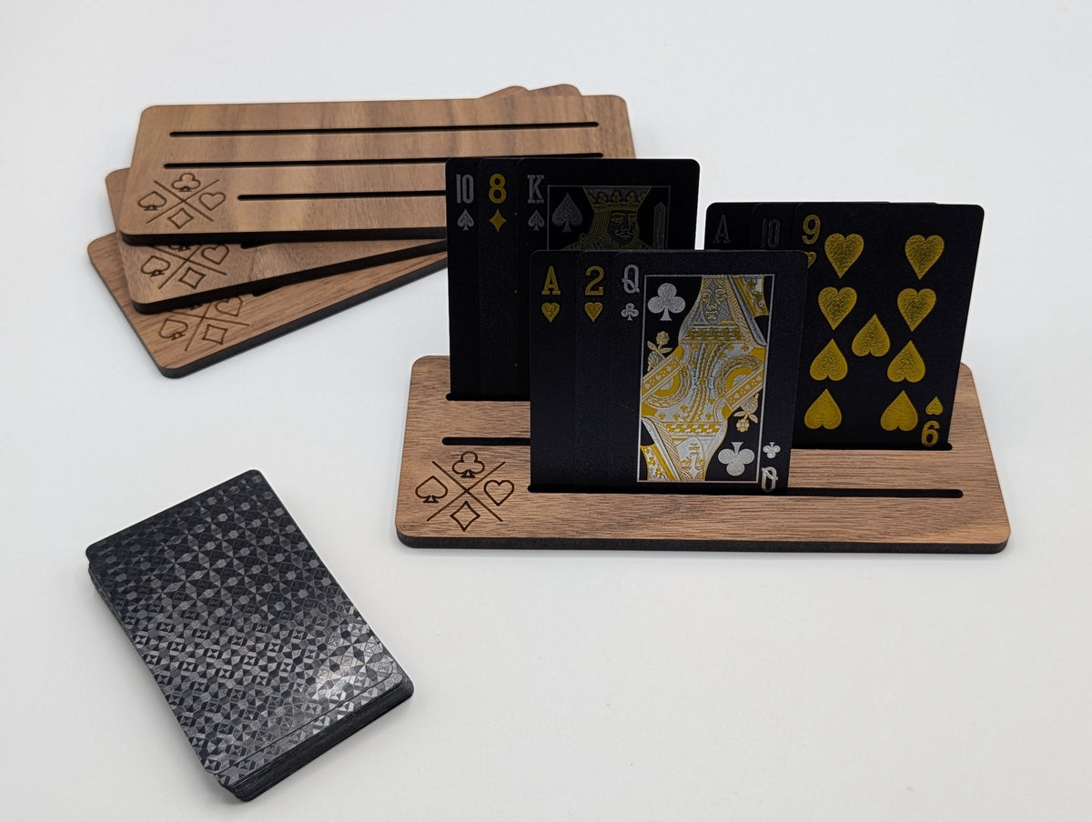 Walnut playing card holders with three slots, one holding cards to show use; playing cards sold separately