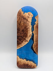 Reverse of Cobalt Passage Origin cribbage board showing cobalt blue resin between figured red mallee burl live edges.