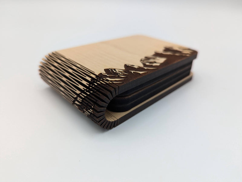 Mountain design on a folding travel cribbage board