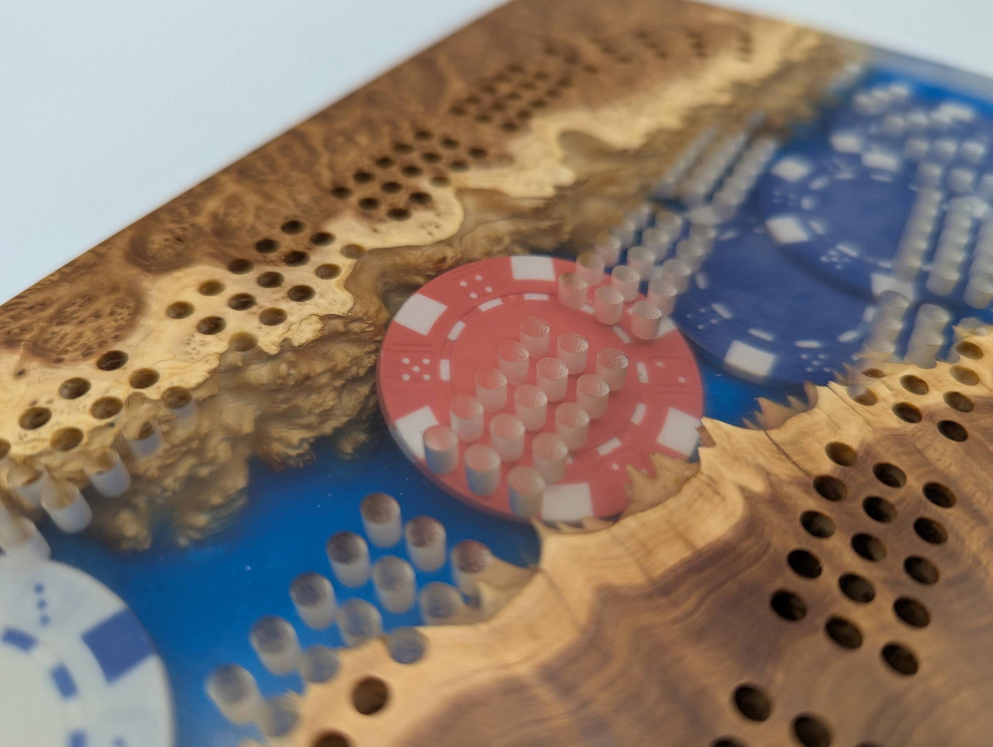 Poker Themed Cribbage Board - 3 Track Live edge brown mallee burl and poker chips over blue epoxy